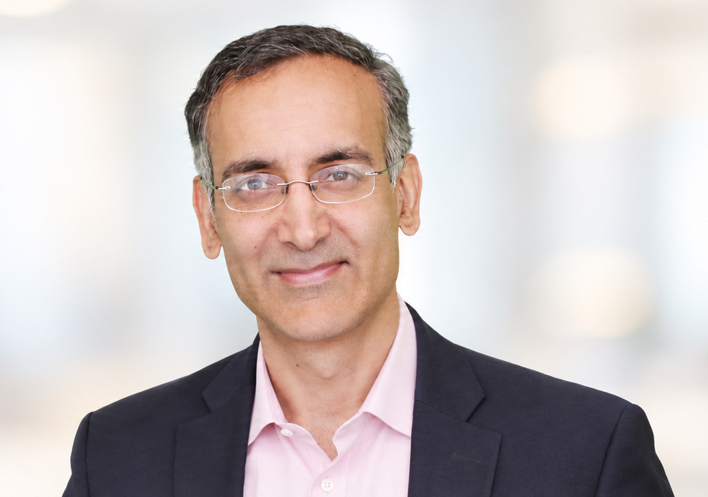 Roy Singh, co-founder and CEO of Korza, in a navy blazer and pale pink shirt